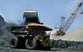 Adani says approval delays halt work on Australia coal project